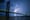 The Verrazzano Bridge at night, a bolt of lightning behind it