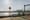 Two men on bikes at the Williamsburg waterfront.