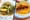 A plate of tacos next to a beach and cheese taco.