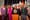 Totally self-respecting politicians pose grinning with basset hound on mayoral podium