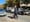 An NYPD officer removes the boy's scooter and backpack from the scene.