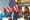 Eric Adams and senior staff sitting in front of an American flag in City Hall