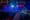 Lights on a NYPD vehicle at night.